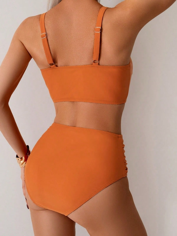 Conjunto biquíni feminino Lumiére laranja com top cropped e bojo, e calcinha hot pants 2